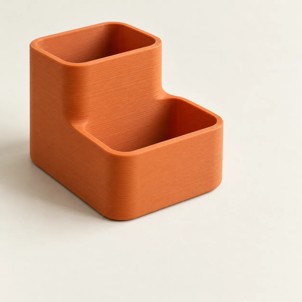 Ein orangefarbener 3D-gedruckter Organizer